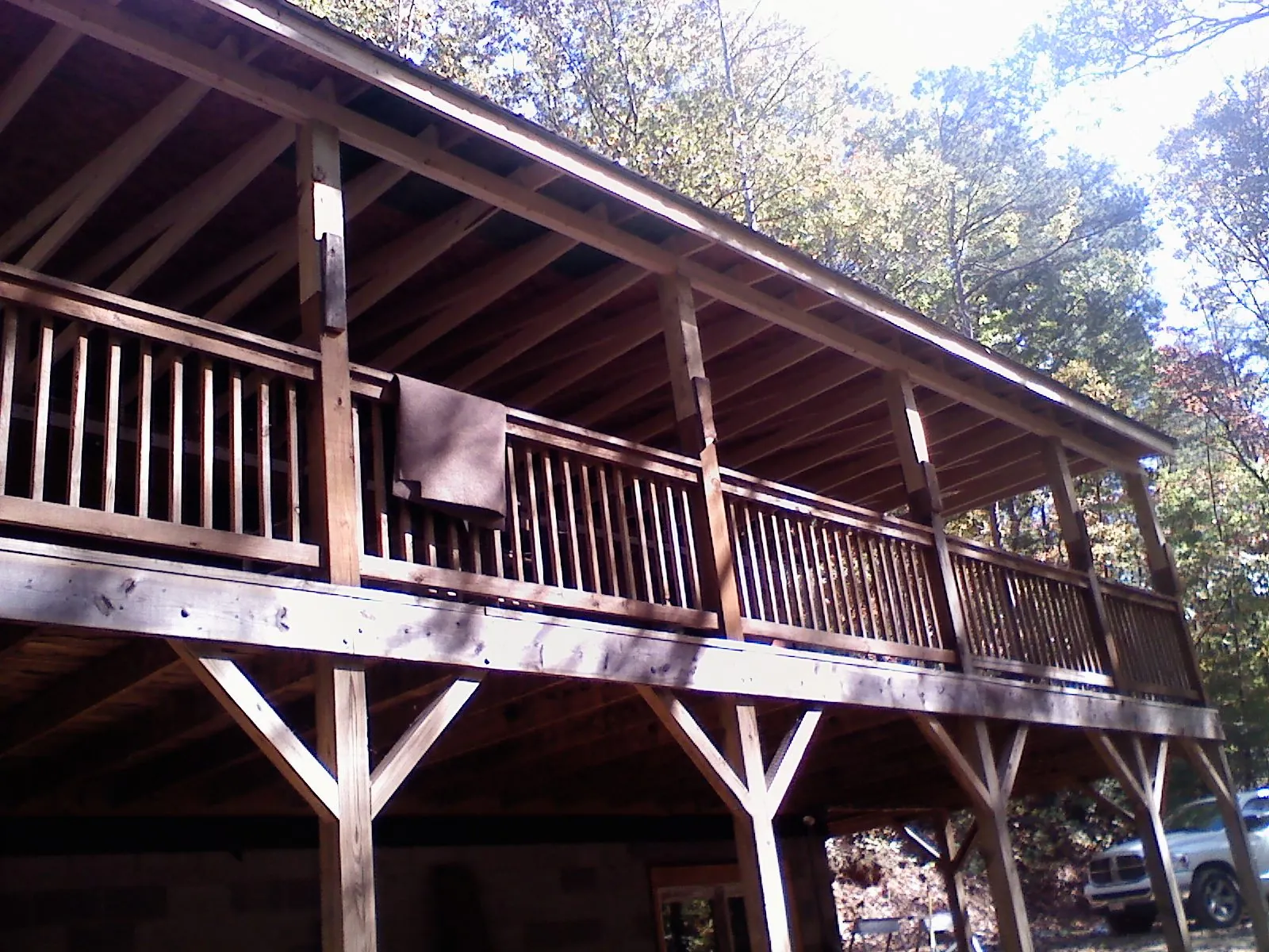 Timber framing under a new elevated porch and deck — Roof Leak Repair in Lebeau by Roofing Brothers